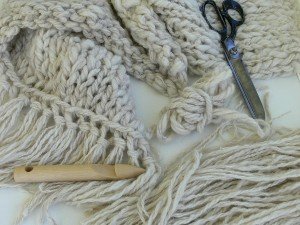mega knitting, big knitting needles, crochet hooks online, making a fringe, putting tassels on a blanket